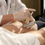 person receiving PRP injection in their knee to avoid total knee replacement